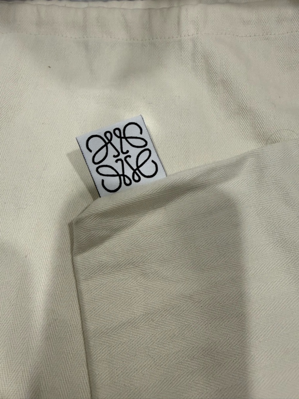 Loewe Cream Dust Bag with Signature Logo Tag, drawstring, 16” x 19”.